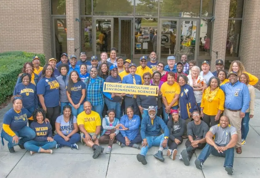 Diverse group of students and faculty at College of Agriculture & Environmental Sciences.