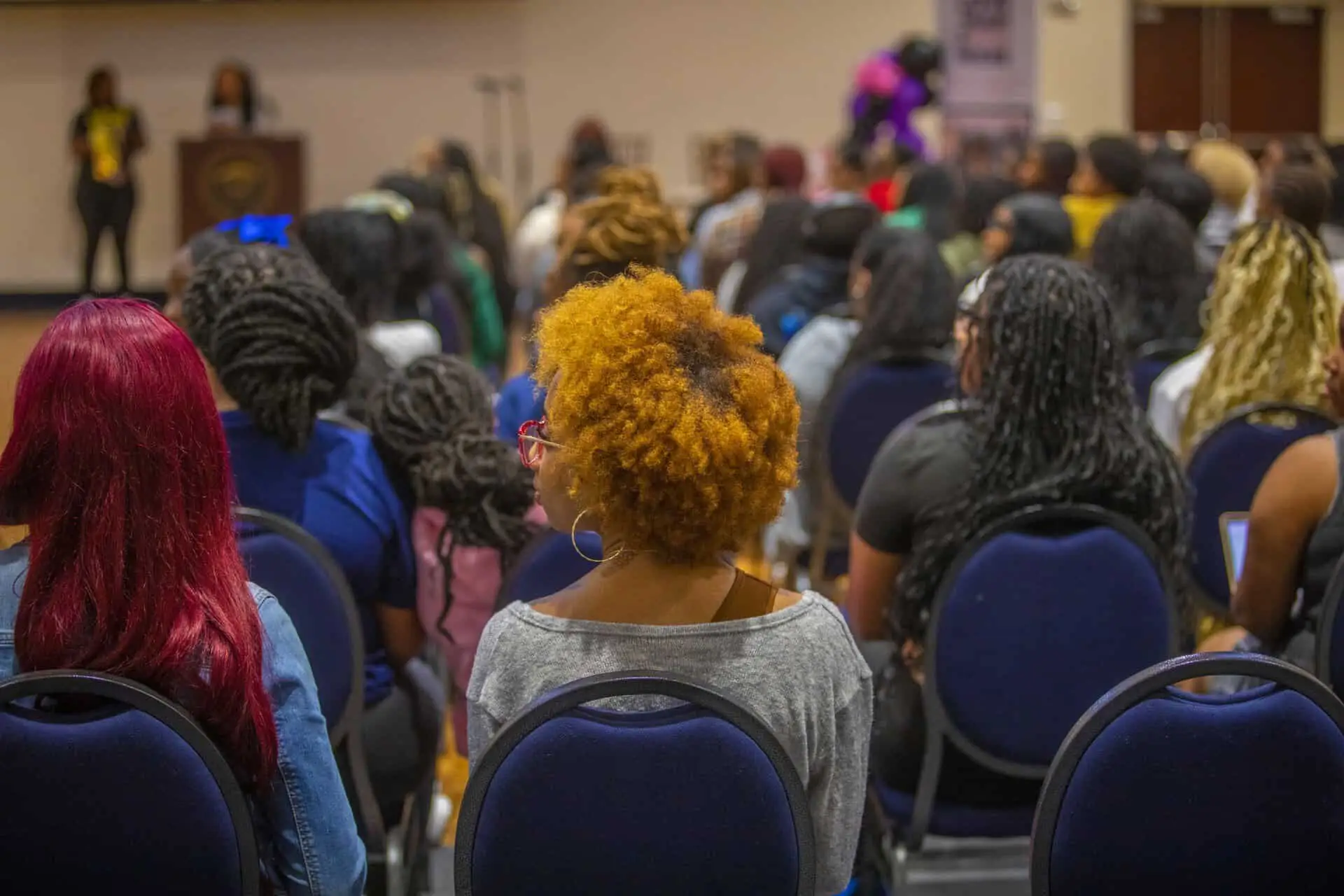 Empowered women attending a conference on diversity and inclusion.